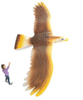 Soaring Hawk Glider Kit With 33 Inch Wingspan featuring realistic feather detail and child for size comparison, outdoor use.