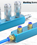Blue Five Way Eight Port Pneumatic Manifold Block Aluminum Air Distribution Block For Compressed Air Systems One Quarter Inch High Flow Air Path Exhaust Distributor in working setup with attached connectors and tubing on a marble surface.