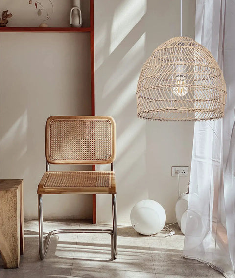 Rattan Chandelier Pendant Light Fixture With Handmade Basket Shade For Farmhouse Decor over chair and white curtain