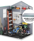 Interior of Sturdy 6x4.4 Ft Outdoor Resin Storage Shed With Reinforced Floor Lockable Door Window And Vent All Weather Bike And Tool Storage, showing tools, ladder, and bikes.
