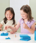 Children using Blue Base Ten Blocks Classroom Set For Math Practice, Hands On Place Value Cubes For Kids, including thousands cube.