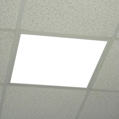 2x2 Foot Edge-Lit LED Panel Kit, Dimmable 0-10V, installed in ceiling grid, displaying bright 5000K daylight white light.