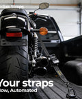 Heavy Duty Retractable Ratchet Straps 2 Inch by 10 Foot 3000 Lb Tie Down Kit for Truck Trailer Motorcycle and ATV with Slick Black Finish securing a motorcycle.