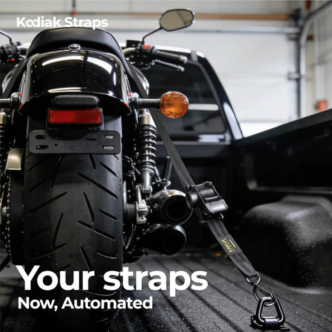Heavy Duty Retractable Ratchet Straps 2 Inch by 10 Foot 3000 Lb Tie Down Kit for Truck Trailer Motorcycle and ATV with Slick Black Finish securing a motorcycle.
