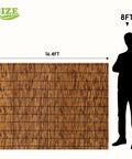 Natural Reed Fence Panel 6 Ft By Sixteen Point Four Ft Bamboo Privacy Screen shown with size comparison to person