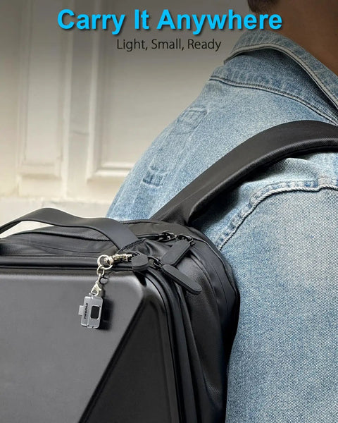 Fingerprint Nano SSD 512GB External Solid State Drive Up To Four Hundred Fifty Megabytes Per Second Pocket Sized Keychain Portable Backup For iPhone iPad MacBook Steam Deck PS5 And More attached to backpack