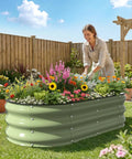 Woman gardening in Raised Garden Bed 4x2 Ft Oval Open Bottom Galvanized Steel, 12 Inch Deep For Outdoor Veggies And Herbs, Rust Resistant
