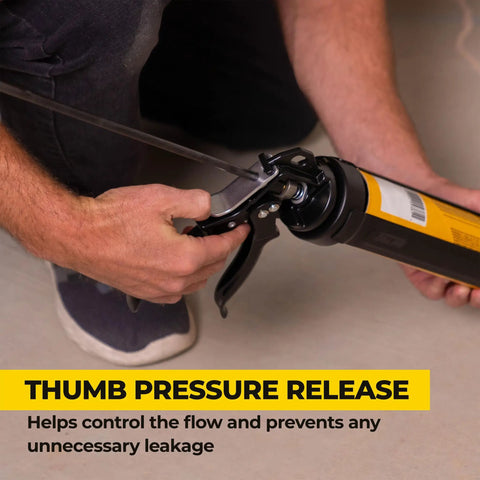 Heavy Duty Caulk Gun 29 oz No Drip Design with 18 to 1 Thrust, shown with thumb pressure release in use