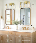 Farmhouse Style Bathroom Vanity Light Fixture With Champagne Gold Finish And Clear Glass Shade For A Dope Vintage Vibe