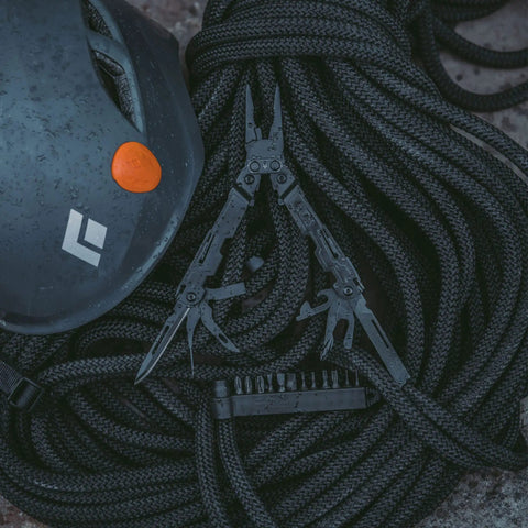 PowerAccess Deluxe All Purpose Heavy Duty Stainless Steel Multi Tool with rope and helmet, ideal for outdoor use.