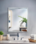 Ultra Slim Beveled Rectangle Slick Chrome Bathroom Wall Mirror 25 Inch By 21 Inch with modern frame above sink in bathroom