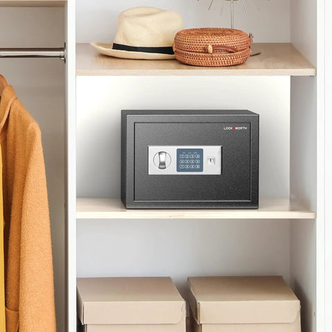 Home Safe Box With 0.6 Cu Ft Stash Space in a closet, digital keypad visible, designed for money, jewelry, documents, and handguns.