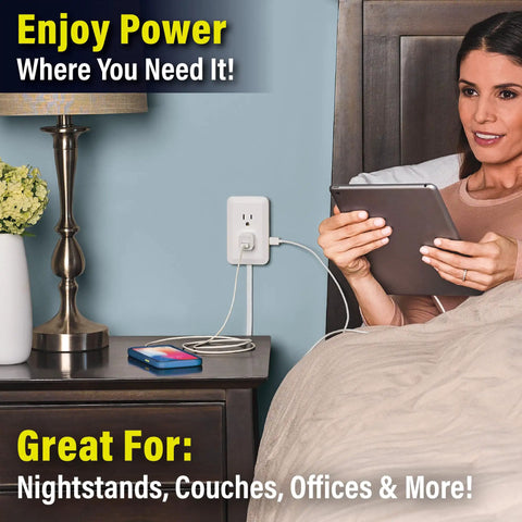 Woman using tablet with Presto Plug Outlet Extender With Built In Shelf, 4 Foot Cord, Peel And Stick Wall Mount on wall
