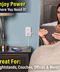 Woman using Presto Plug Outlet Extender For Reaching Hidden Outlets With A 6 Foot Cord Peel And Stick On Wall No Wiring No Tools Surge Protected With Two AC Outlets Two USB Ports And Built In Shelf White next to bed