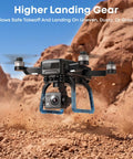 Pro Grade 4K Drone With 3 Axis Gimbal For Adults flying over rocky terrain, highlighting higher landing gear in action.