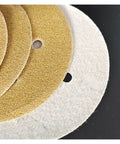 Top Tier 100 Piece Sanding Discs With Velcro Hook And Loop Backing For Fast Grit Swaps On Wood Metal And Auto Bodyworks Featuring Durable Flocking Paper With 600 Grit Polishing Power To Shiny Smooth Results showing different textured sanding discs.