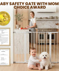 Woman in kitchen with baby and dog by extra wide baby gate for stairs and doorways 29.7 to 46 inch adjustable pressure mounted gate.