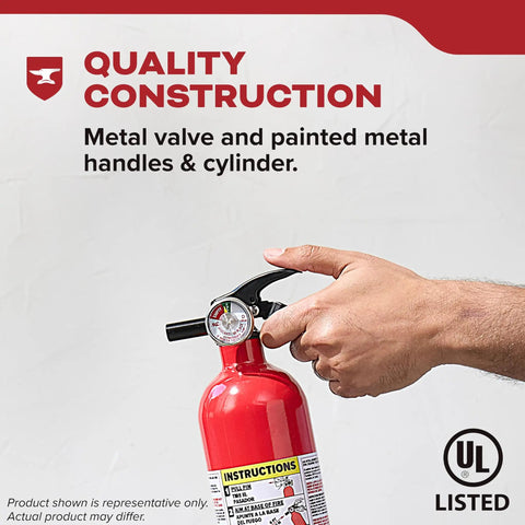 Person holding Home And Office Fire Extinguisher 5BC For Residential Use with Easy Pull Pin and aluminum body