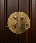 Old School Vintage Round Zinc Alloy Latch Locks for Wooden Boxes and Furniture, antique style, mounted on a dark wooden cabinet.