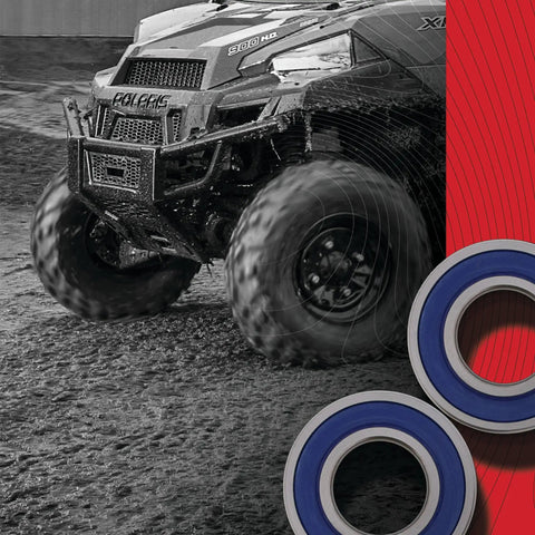 Mud-splattered ATV with Wheel Bearing Seal Kit For Suzuki Yamaha Honda Replacement High Speed ABEC 3 Bearings on red backdrop.
