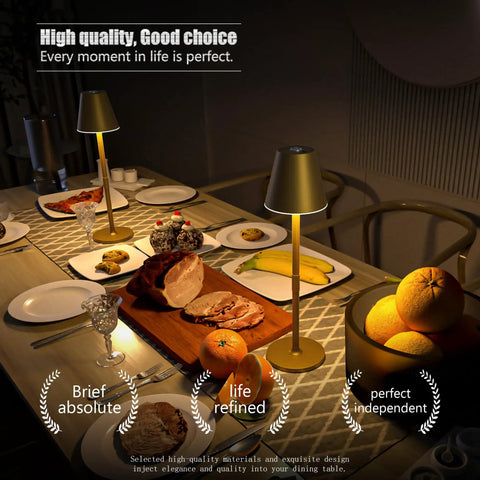 Cordless 2 Pack Desk Lamps With 5000mAh Rechargeable Battery illuminating dining table with food and tableware, bronze finish.