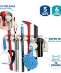 Mop And Broom Holder Wall Mount With Five Slots And Six Hooks, Heavy Duty Garage Organizer holding various cleaning tools.