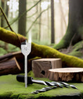 1 1/4 Inch Wood Spade Drill Bit Set 3 Piece Pack High Carbon Steel Flat Paddle Tools on mossy forest floor with wood logs.