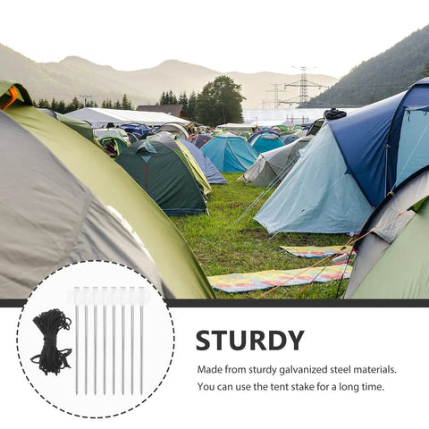 Camping scene with tents using Heavy Duty Tent Stakes Set with Fluorescent Ground Pegs and Dark Cord, perfect for hard ground anchoring.