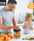 Lebenlang Electric Orange Juicer With Two Cones BPA-Free High Yield Citrus Squeezer Press for lemons limes in use with child.