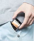 Bluetooth 5.3 MP3 Player With Dope HiFi Lossless Sound Portable Music Player in pocket showing 2.4 inch touchscreen interface