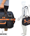 Man carrying 20 Inch Electrician Tool Bag Pro Grade Beast Heavy Duty Tote With 32 Pockets And Big Mouth Opening in hand and on shoulder.
