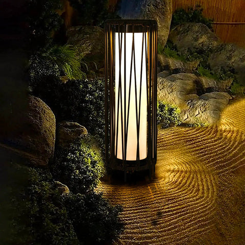 Outdoor Solar Floor Lamp With Rattan Trim And Steel Frame, Waterproof Patio Lantern illuminating garden path