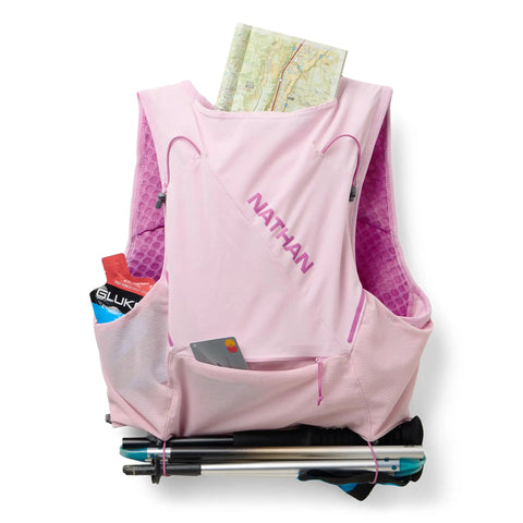 Back view of Pinnacle Pro 6L Women's Hydration Vest with Second Skin Fit in Light Pink Fuchsia, holding map and snacks in pockets