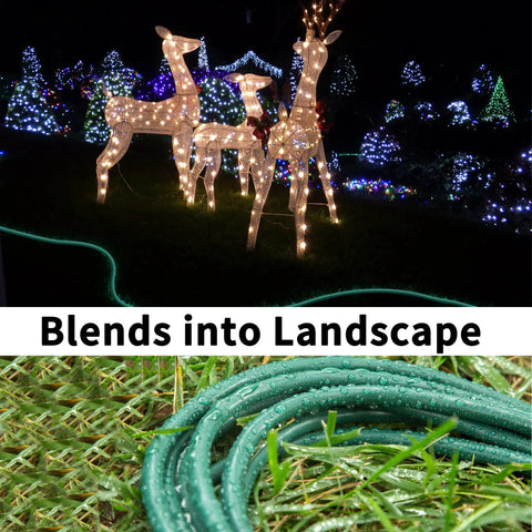 Close-up of Green Outdoor Extension Cord 100 Ft Waterproof 16/3 Gauge SJTW Flexible Cold-Resistant in a yard with holiday lights.