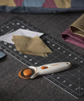 45mm Rotary Cutter For Fabric, Cuts Through Multiple Layers, Left Or Right Handed, Easy Safe Blade Change on cutting mat