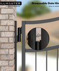 Seven Inch Heavy Barrel Gate Hinges Built Tough As Nails Rock Solid Steel Construction Supports 900 Pounds Weld On Matte Black Finish Perfect For Fence Gates And Driveway Ramps Two Pack greaseable gate hinge mounted on a fence.