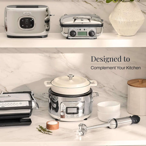 Heavy Duty Stainless Steel Immersion Blender With Kickass 600 Watt Motor And Turbo Switch on kitchen shelf with other appliances.