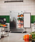 Industrial Reach In Refrigerator With 47 Cu Ft Hella Spacious Double Solid Doors Commercial Grade Stainless Steel Build For Breakrooms, filled with fresh produce and meats.