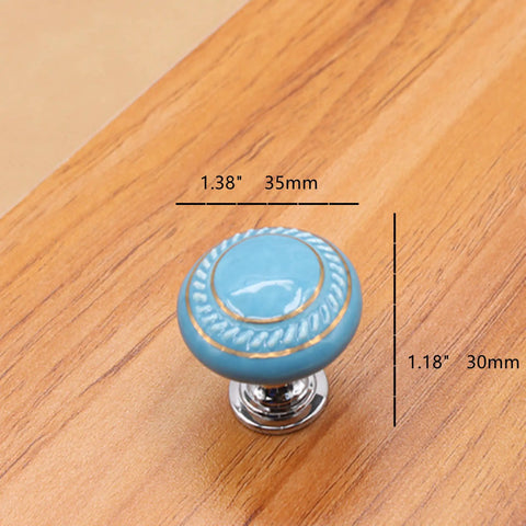 Totally Groovy Blue Mushroom Ceramic Cabinet Knobs, 6 Pack, 1.38 Inch Diameter on wood surface with measurements.