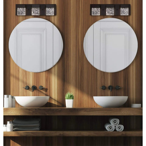 Cava II Three Light LED Indoor Wall Fixture in Matte Black with Bubble Glass above round mirrors in modern bathroom