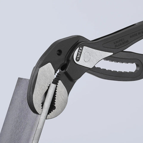 Alligator Water Pump Pliers XL 16 Inch Beefy Grip Self Locking for Pipes and Nuts gripping a metal pipe