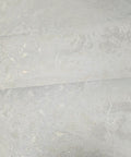 Ivory And Off White Rose Gold Cracked Faux Concrete Plaster Textured Wallpaper Rolls close-up view of cracked plaster texture
