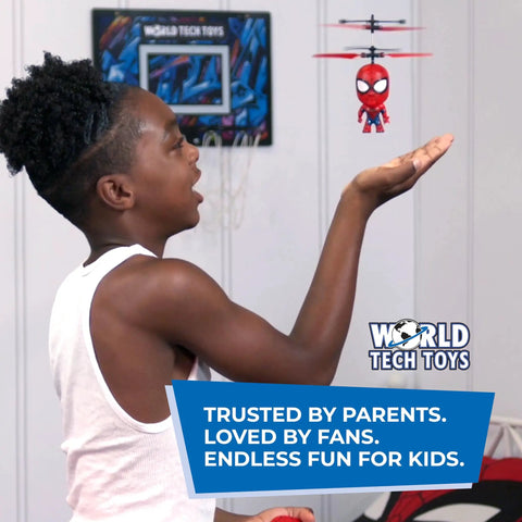 Child playing indoors with Marvel Spider Man Big Head Helicopter Toy With Motion Sensing Flight For Kids 6 Plus Officially Licensed Spider Man Hero Drone Toy That Totally Brings Web Sling Action To Life