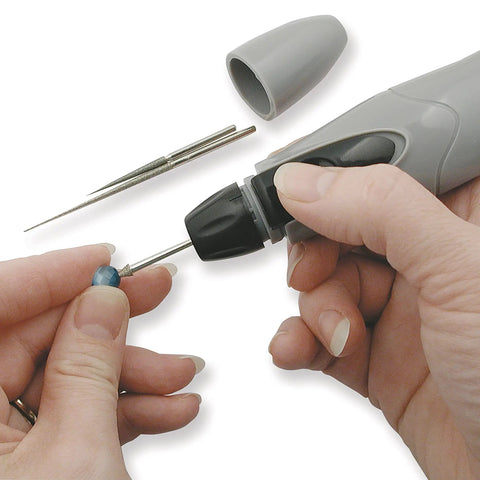 Cordless Motorized Bead Reamer for opening and enlarging holes in glass ceramic or stone with 3 diamond points in hand use
