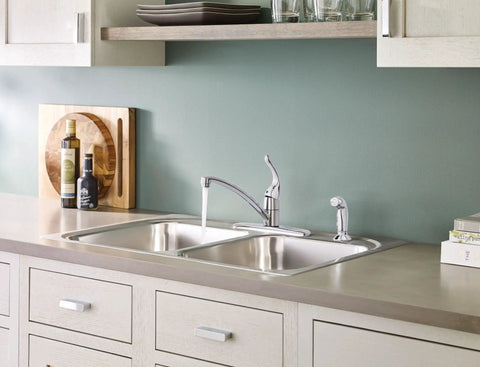 Low Arc Chrome Kitchen Faucet With Side Sprayer And Pull Out Spray Head, Single Handle, 4 Hole Mount, installed in kitchen