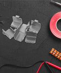 Heavy Duty Freezer Shelf Clips And Refrigerator Support Brackets Set 50 Pieces on black background with tools nearby