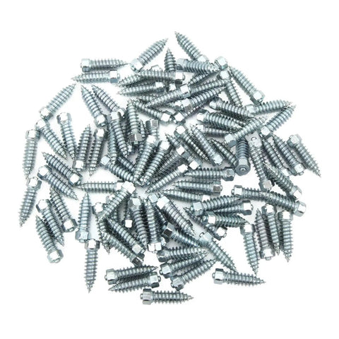 Tough As Nails M8 Snow Tire Screws 100 Piece Set Tungsten Steel Spikes laying scattered on a white surface, showing sharp edges for grip.