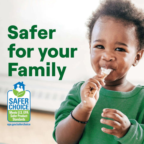 Child in green shirt eating with text 'Safer for your Family' and U.S. EPA Safer Choice badge in the background.