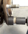 Wheel Stud Installer Tool For Cars And Light Trucks Quick Lug Nut Style Stud Puller in use with impact wrench on wheel hub