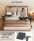 Adjustable Height C Shaped End Table With Split Tilting Top And Gas Spring Lift, shown by a bed with dual-side tilt feature.